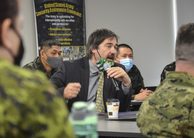 USASAC New Cumberland’s Deputy Chief of Staff for Logistics, G4, Michael Casciaro addresses the room about the benefits of having Security Assistance Liaison Officers stationed in USASAC. The SALO program allows military representatives from key...