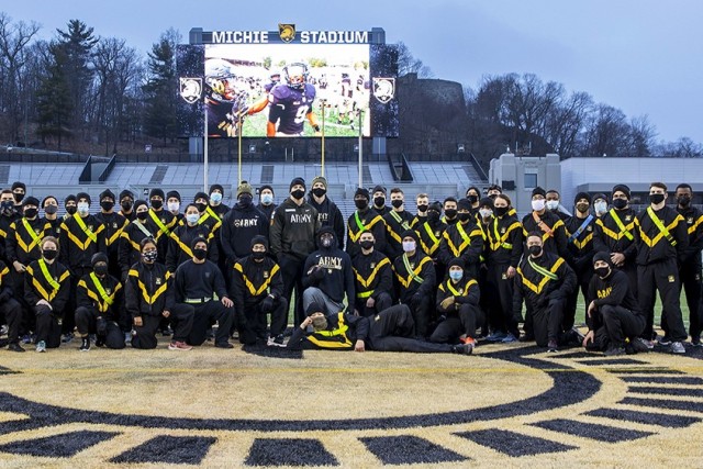 Soldiers participate in physical training during the U.S. Army People First Task Force Solarium at Michie Stadium March 18.    (Photo by Spc. Laura Hardin)