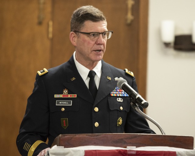 Maj. Gen. Daniel Mitchell, commanding general, U.S. Army Sustainment Command, provides remarks during a retirement ceremony held in honor of K Krewer, chief counsel, U.S. Army Materiel Command Legal Center-Rock Island Arsenal, at Rock Island Arsenal, Illinois, March 26. (Photo by Linda Lambiotte, ASC Public Affairs)