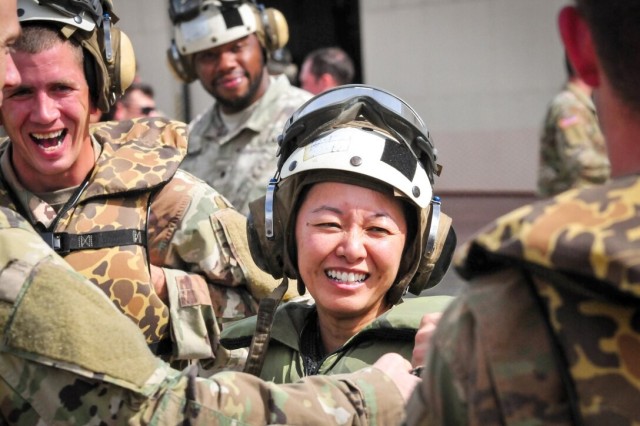 Col. Danielle Ngo shares a laugh with Soldiers during training at Marine Corps Base Hawaii in 2018. Ngo is now the executive officer to the Army&#39;s inspector general in Washington, D.C.