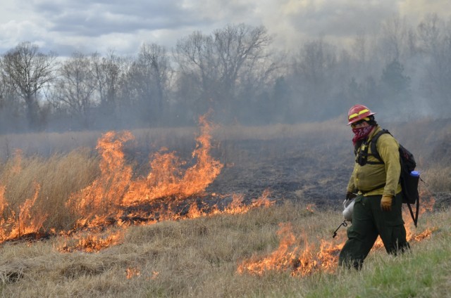 Marty Wilson, a forester with the U.S. Army Corps of Engineers, creates a fire break along the roadside March 22 at Training Area 48 to assist with a controlled burn. Fort Campbell’s Directorate of Public Works partners with the U.S. Army Corps...