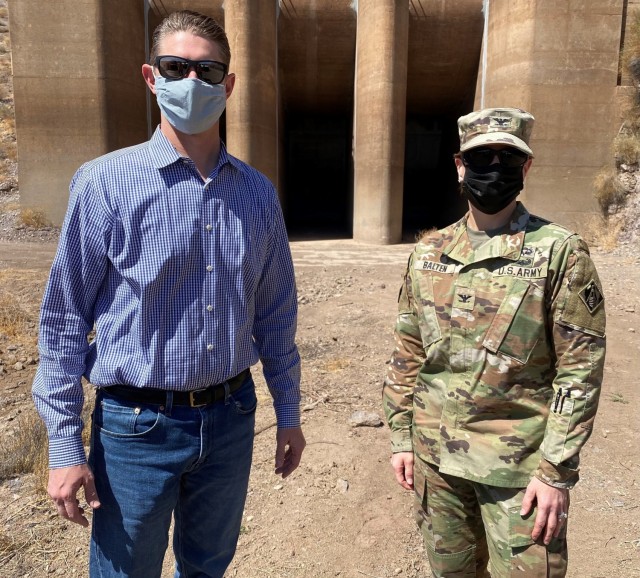 Col. Julie Balten, commander of the U.S. Army Corps of Engineers Los Angeles District, right, and David Van Dorpe, deputy district engineer for the LA District, left, visit Painted Rock Dam March 24 near Gila Bend, Arizona. The inflow gates,...
