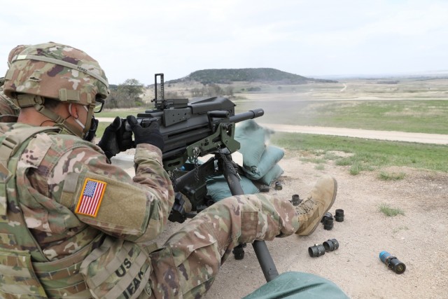 Spc. Christian Perez, Headquarters and Headquarters Company, 40th Combat Aviation Brigade, fires the MK19 grenade launcher, March 17, 2021 at North Fort Hood, Texas. (U.S. Army National Guard photo by Sgt. 1st Class Ryan Sheldon)