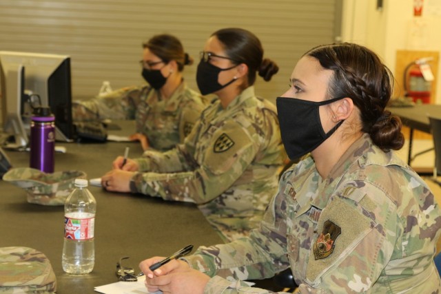 Airman 1st Class Joanna Rodriguez, Spc. Priscilla Perez and Pfc. Allysha Greaves attend the 32d Army Air and Missile Defense’s joint Army Integrated Air and Missile Defense (IAMD) course for military intelligence professionals here on Fort Bliss, Texas.