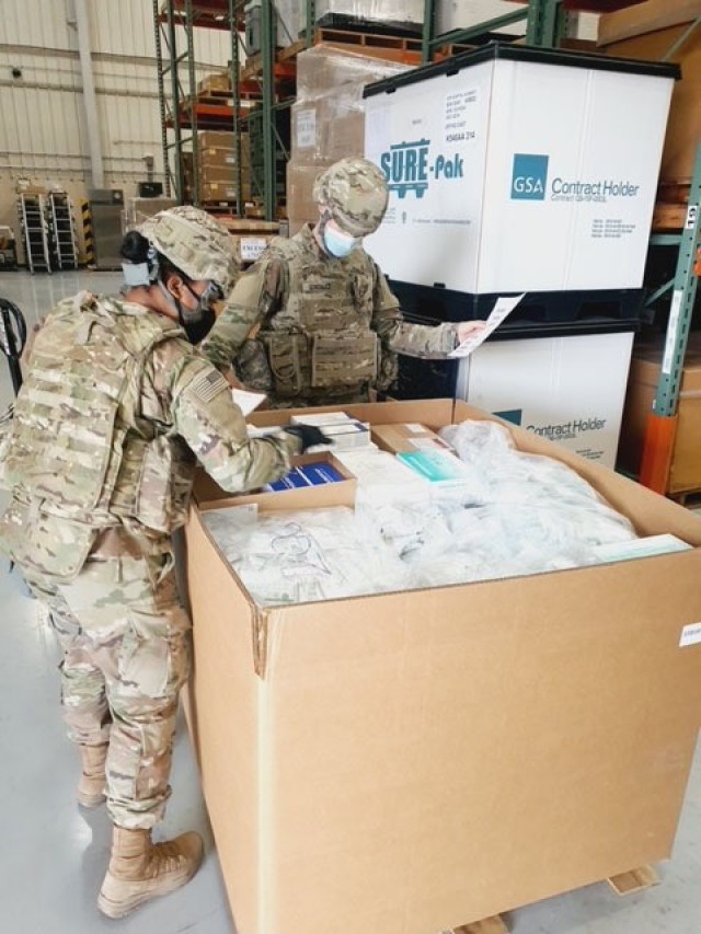 Pvts. Trezia Davenport and Alan Gonzalez, assigned to the 563rd Medical Logistics Company, assemble a tactical combat medical care resupply set in support of U.S. Forces Korea during an exercise at the Army’s prepositioned stocks site in South Korea.