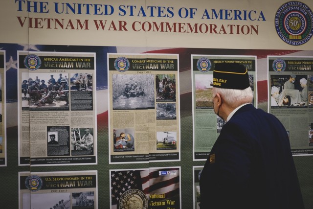 Memories return to Vince Clark, a Vietnam veteran, as he admires imagery from the war during Vietnam War Recognition Day, March 29, 2021 in Vicenza, Italy.