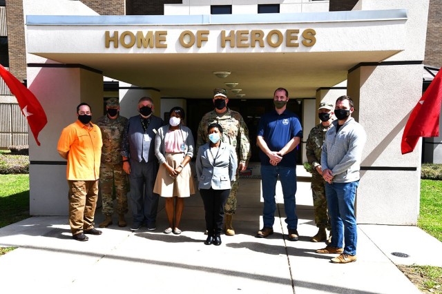 Maj. Gen.Timothy P. McGuire, IMCOM deputy commander, Col. Ryan K. Roseberry, Fort Polk garrison commander, and Command Sgt. Maj. Christopher Ausbun, garrison commander sergeant major, stand with Fort Polk IMCOM civilians who were awarded IMCOM...