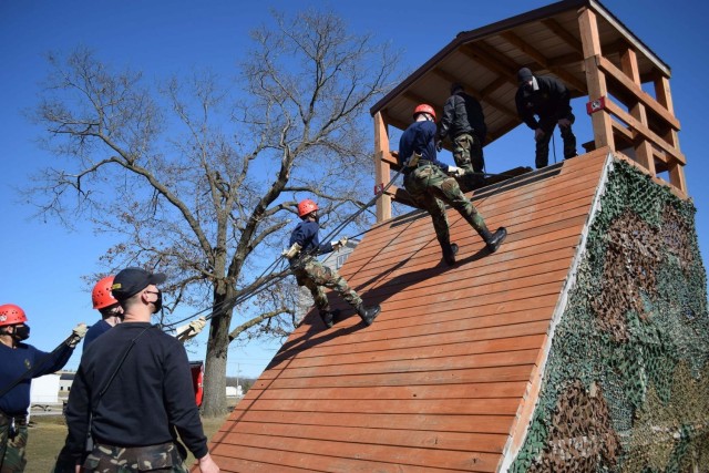 Wisconsin Challenge Academy cadets participate in rappelling training on the cantonment area March 16, 2021, during training at the academy complex at Fort McCoy, Wis. The academy is a tenant organization at Fort McCoy that is managed by the...