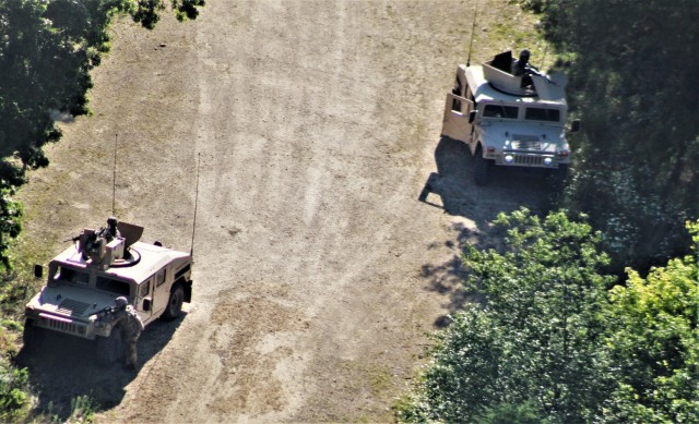 Service members hold training Aug. 4, 2020, at a training area on South Post at Fort McCoy, Wis. Training like this contributed to Fort McCoy’s $1.479 billion local economic impact during fiscal year 2020. Thousands of people train at the...