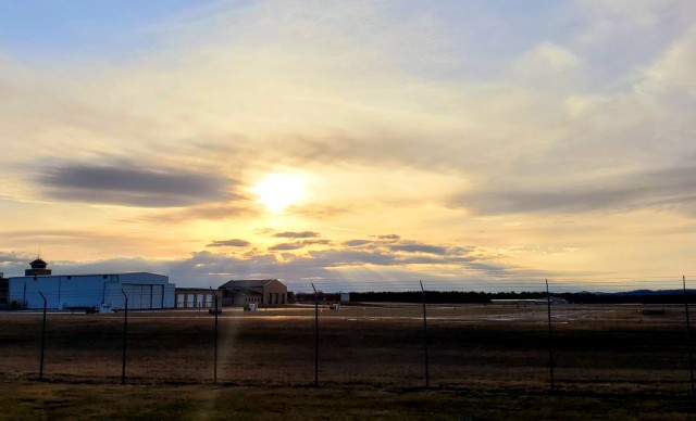 A scene of the setting sun is shown March 26, 2021, over the Sparta-Fort McCoy Airport, located on South Post at Fort McCoy, Wis. The airport is regularly used for training by military units, especially the Army and Air Force. Aircraft that have...