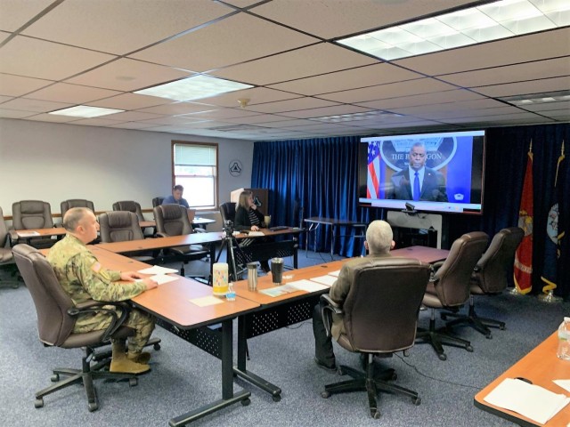 Fort McCoy Garrison command team members carry out virtual training for extremism awareness March 26, 2021, in the garrison headquarters at Fort McCoy, Wis. The training was mandatorily directed by the Department of Defense and the Army. (U.S. Army Photo by Jaime Herrera/Fort McCoy Garrison)