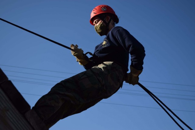 A Wisconsin Challenge Academy cadet participates in rappelling training on the cantonment area March 16, 2021, during training at the academy complex at Fort McCoy, Wis. The academy is a tenant organization at Fort McCoy that is managed by the...
