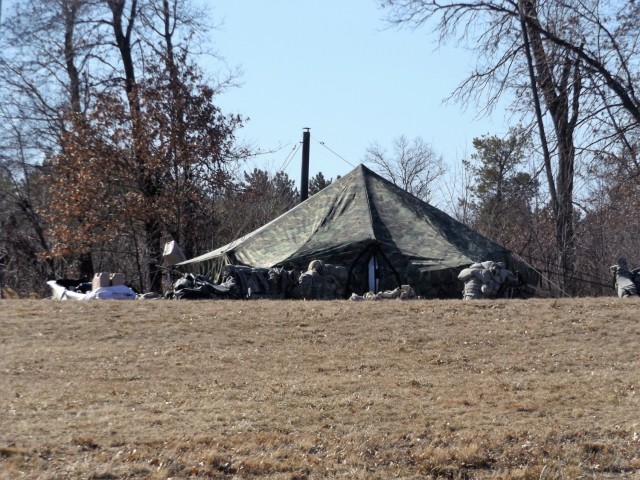 Students in Fort McCoy Cold-Weather Operations Course (CWOC) class 21-05 participate in a cold-weather training scenario March 19, 2021, on South Post at Fort McCoy, Wis. CWOC students are trained on a variety of cold-weather subjects, including...