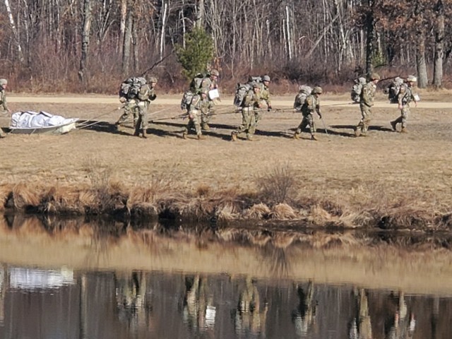 Students in Fort McCoy Cold-Weather Operations Course (CWOC) class 21-05 participate in a cold-weather training scenario March 19, 2021, on South Post at Fort McCoy, Wis. CWOC students are trained on a variety of cold-weather subjects, including...