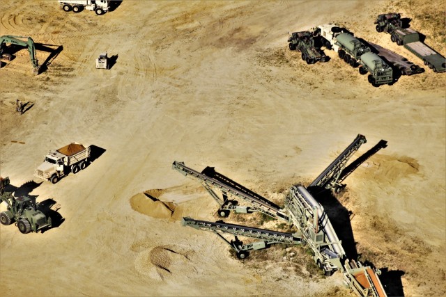 Service members hold training Aug. 4, 2020, at a training area on South Post at Fort McCoy, Wis. Training like this contributed to Fort McCoy’s $1.479 billion local economic impact during fiscal year 2020. Thousands of people train at the...