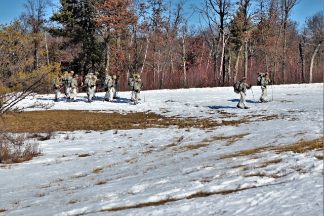 Students in Fort McCoy Cold-Weather Operations Course (CWOC) class 21-04, which mainly was comprised of Airmen, participate in cold-weather training scenario Feb. 26, 2021, on South Post at Fort McCoy, Wis. CWOC students are trained on a variety...