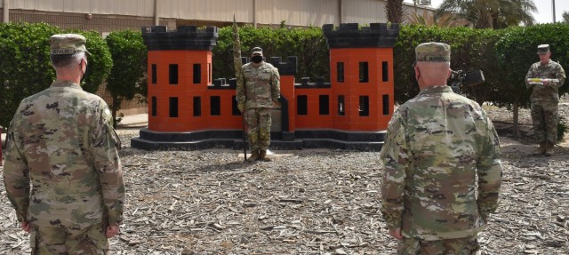 SFC Joseph Harrison stands tall with the cased colors of the District while Major Ed Zook reads the orders of the day as Transatlantic Afghanistan District Commander, Mark Geraldi and Command Sergeant Major SGM Nathan Marshall prepare to join...