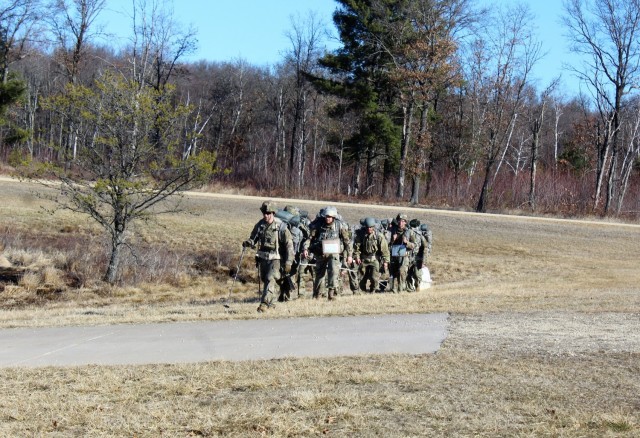 Students in Fort McCoy Cold-Weather Operations Course (CWOC) class 21-05 participate in a cold-weather training scenario March 19, 2021, on South Post at Fort McCoy, Wis. CWOC students are trained on a variety of cold-weather subjects, including...
