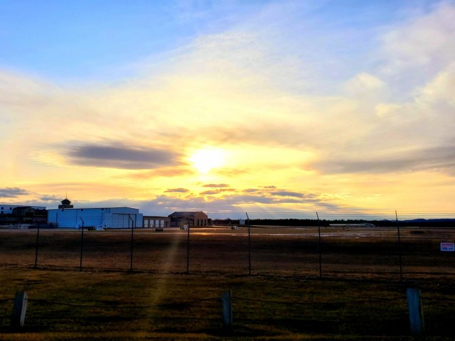 A scene of the setting sun is shown March 26, 2021, over the Sparta-Fort McCoy Airport, located on South Post at Fort McCoy, Wis. The airport is regularly used for training by military units, especially the Army and Air Force. Aircraft that have...