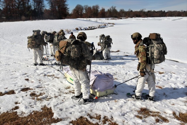 Students in Fort McCoy Cold-Weather Operations Course (CWOC) class 21-04, which mainly was comprised of Airmen, participate in cold-weather training scenario Feb. 26, 2021, on South Post at Fort McCoy, Wis. CWOC students are trained on a variety...