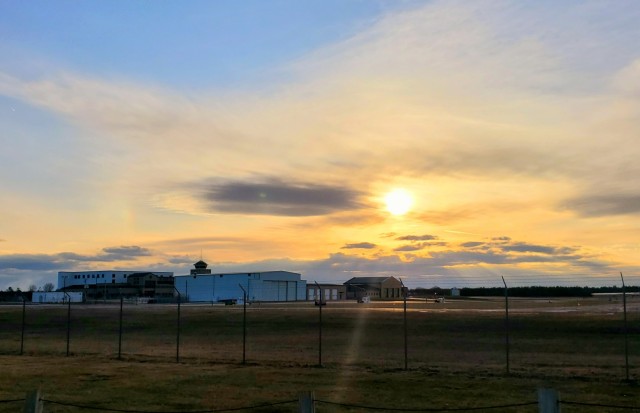 A scene of the setting sun is shown March 26, 2021, over the Sparta-Fort McCoy Airport, located on South Post at Fort McCoy, Wis. The airport is regularly used for training by military units, especially the Army and Air Force. Aircraft that have...