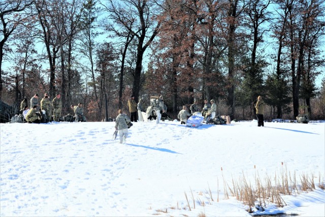 Students in Fort McCoy Cold-Weather Operations Course (CWOC) class 21-04, which mainly was comprised of Airmen, participate in cold-weather training scenario Feb. 26, 2021, on South Post at Fort McCoy, Wis. CWOC students are trained on a variety...