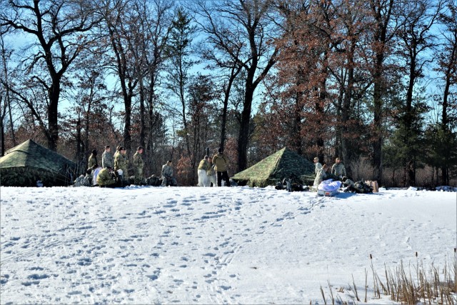 Students in Fort McCoy Cold-Weather Operations Course (CWOC) class 21-04, which mainly was comprised of Airmen, participate in cold-weather training scenario Feb. 26, 2021, on South Post at Fort McCoy, Wis. CWOC students are trained on a variety...