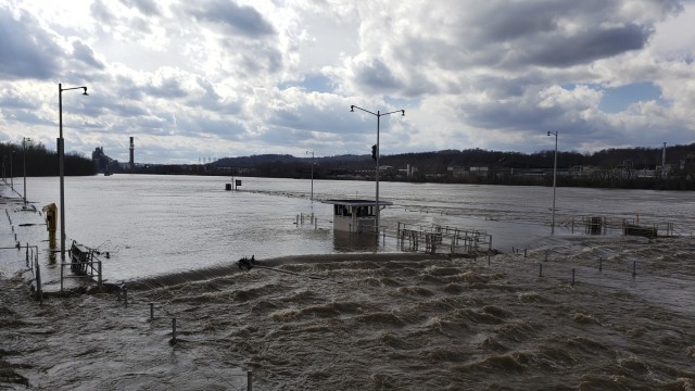 Flood waters forced closure of the Locks and Dams 3 on the Monongahela River in Elizabeth, Pennsylvania, March 1, 2021. High water from snow melts and extended rain affected the U.S. Army Corps of Engineers Pittsburgh District on the Monongahela River in early March. Elizabeth Locks and Dams (L/D 3) was taken out of service as water entered the operating machinery and topped the lock walls. The average time of high-water stopping operation was 30 hours. The lock staff cleared mud and debris, and each lock was returned to service within eight hours of water receding. Elizabeth is one of the oldest functioning locks in the nation, 114 years old. (U.S. Army Corps of Engineers Pittsburgh District Photo by Philip Delo)