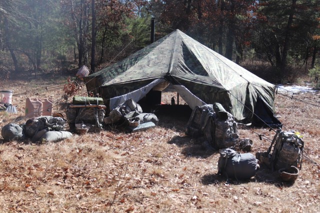 A tent set up by students in Fort McCoy Cold-Weather Operations Course (CWOC) class 21-05 during shelter-building training is shown March 11, 2021, at Fort McCoy, Wis. CWOC students are trained on a variety of cold-weather subjects, including...