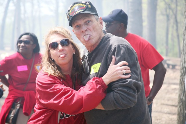 Kerrie Branson, Survivor Outreach Services coordinator for Redstone Arsenal, Alabama, playfully poses with Perry Ramsey, whose son was killed in Afghanistan in August 2011, during a U.S. Army Space and Missile Defense Command-sponsored Spring...