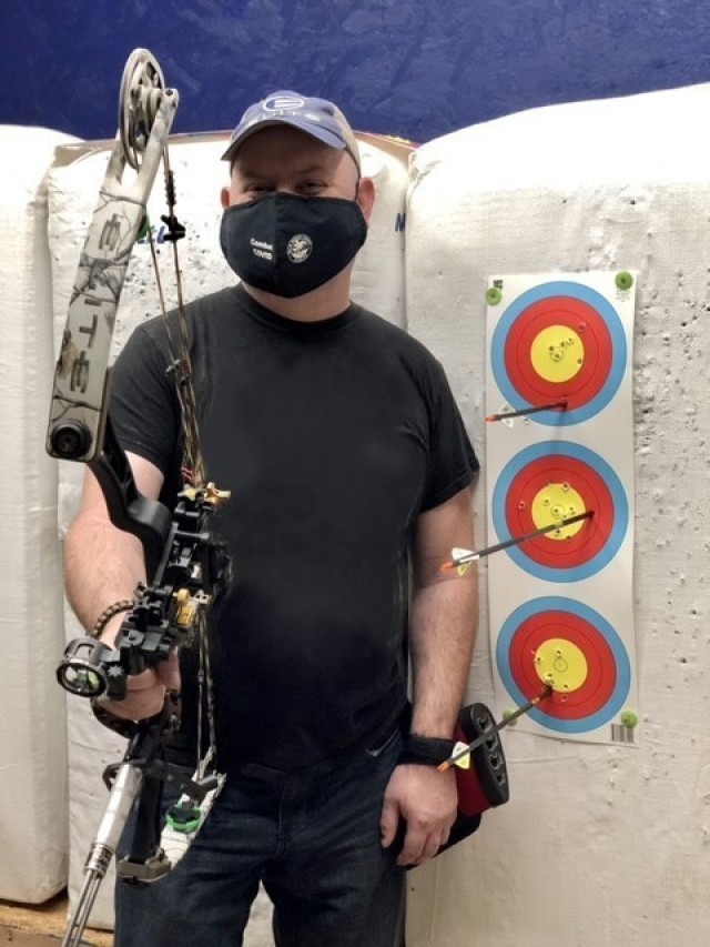 Cpl. Chance Boleware posed in front of a target at Fort Campbell, Ky., in early March. He competed in field, shooting, archery and powerlifting during Army Trials 2021. (Photo courtesy of Robyn Womac)
