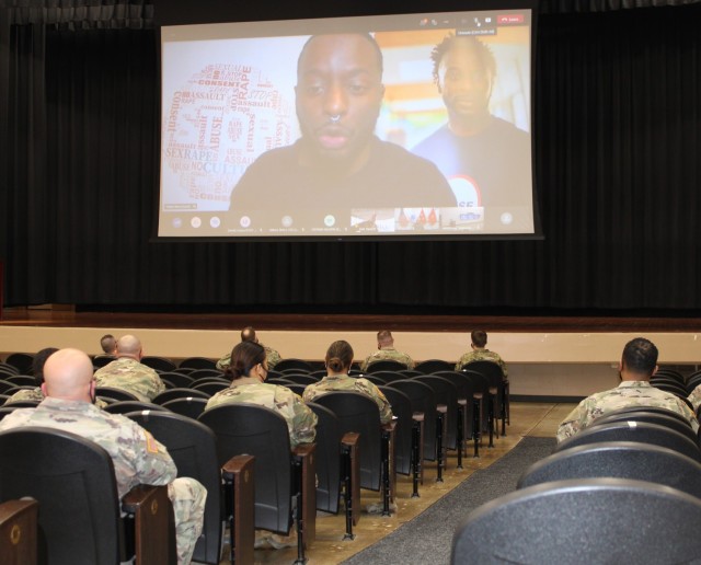 1st Theater Sustainment Command soldiers and civilian employees watch a presentation from Poet and Sexual Violence Prevention Advocate Obbie West at Olive Theater at Fort Knox, Kentucky, March 29, 2021, kicking off Sexual Assault and Awareness Prevention Month.