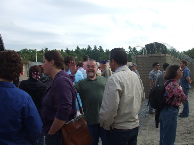 Surrounded by friends and co-workers, Jackson ‘Buz’ Mormann (waving), U.S. Army Tank-automotive and Armaments Command senior editor/technical writer, waves to the camera.  He is retiring at the age of 80 from his position at Natick,...