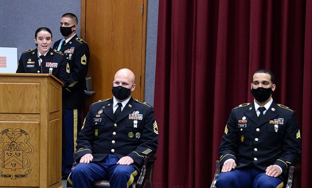 Guest speaker Master Sgt. Nickie Wileman, 15th Military Police Brigade S-3 sergeant major, charges Sgt. 1st Class Chad Hickey, 291st MP Company, 40th MP Battalion (Detention), and Sgt. Anthony Hogan, 256th MP Company, 40th, to be the best versions...