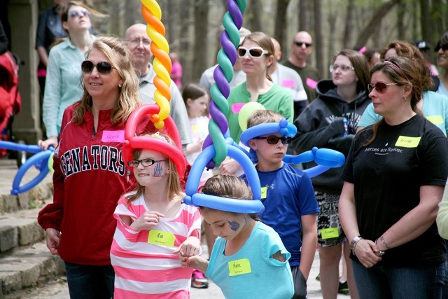 Kerrie Branson, Survivor Outreach Services coordinator for Redstone Arsenal, Alabama, left in the red Senators jacket, stands with Gold Star Families during a U.S. Army Space and Missile Defense Command-sponsored Spring Fling for Gold Star...