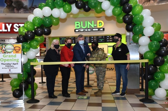 A ribbon-cutting ceremony was held at the Fort Drum Exchange food court April 1 for the grand opening of the Bun-D restaurant. The restaurant’s menu is a variety of salads, wraps, rice bowls and beverages that contain only fresh, all-natural foods and unprocessed ingredients. (Photo by Mike Strasser, Fort Drum Garrison Public Affairs)