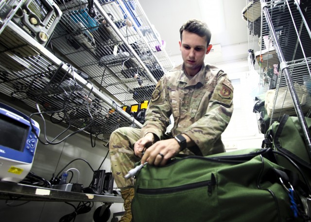 LANDSTUHL, Germany – U.S. Air Force Tech Sgt. Adam Cardoza, Noncommissioned Officer in charge, Pulmonary Clinic, Landstuhl Regional Medical Center, performs a preflight inspection on equipment as part of the 86th Medical Squadron’s Critical Care Air Transport Team operations, March 23. Cardoza, a native of Dana Point, California, was recognized as the Air Force’s top Cardiopulmonary Laboratory Noncommissioned Officer of the Year of 2020.