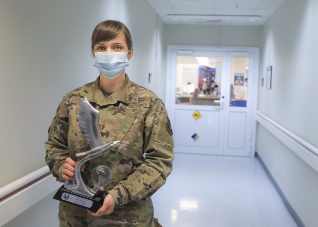 U.S. Air Force Capt. Mary Storey, chief, Core Laboratory, Landstuhl Regional Medical Center, holds the 86th Airlift Wing&#39;s Company Grade Officer of the Year award, which she earned in recognition of her accomplishments over 2020. Storey, a...