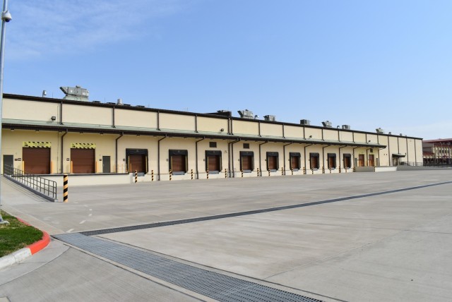 Captured is the new Army storage warehouse staging and loading docks, which was turned over to Col. Garrett Cottrell, Deputy Commanding Officer - Transformation, U.S. Army Corps of Engineers Far East District, on behalf of the U.S. government by...