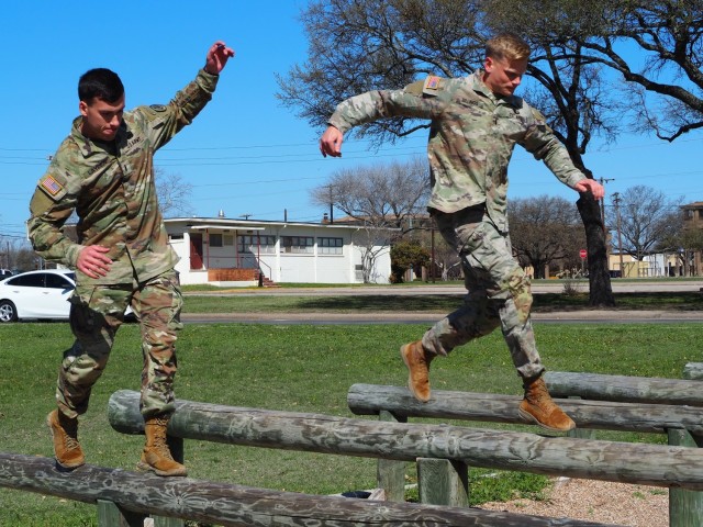 1st Lt. Nick Layden from 4th Squadron, and 1st Lt. Brian Billings from 2nd Squadron, 3rd Cavalry Regiment, used obstacle courses in Brave Rifles Country to train up for the Best Ranger Competition. They said that they were motivated by other Troopers training for competitions currently taking place within the Regiment. The contest runs from April 11-16 at Fort Benning, Georgia. (U.S. Army photo by Pfc. Johnathan Touhey)