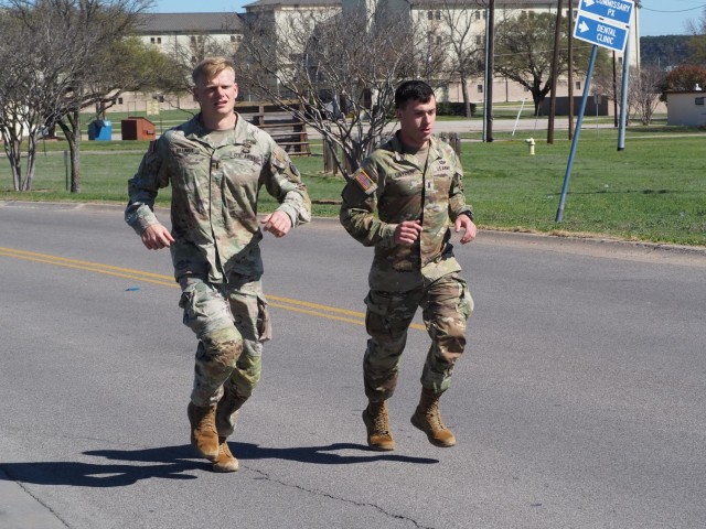 1st Lt. Brian Billings from 2nd Squadron and 1st Lt. Nick Layden from 4th Squadron, 3rd Cavalry Regiment, have covered over 400 miles the past two months collectively during their train up for the Best Ranger Competition. The competition runs from April 11-16 at Fort Benning, Georgia. (U.S. Army photo by Pfc. Johnathan Touhey)