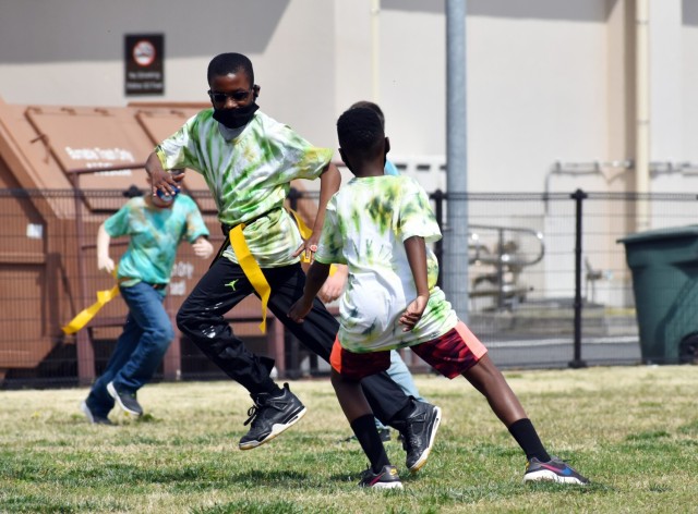 Deveyaun Meux-Mabon, left, a fifth-grader, and Donald Meachem, a sixth-grader, participate in the 2021 School Age Center Olympics at Sagamihara Family Housing Area, Japan, April 1.