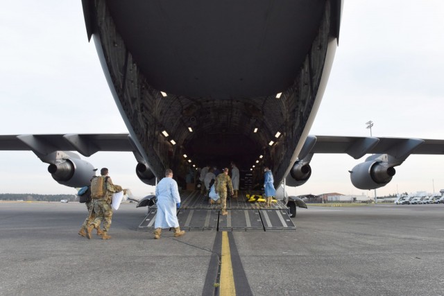 62 AW airlifts COVID-19 patient to Texas