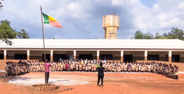 Dozens of students pose in front of a recently completed school facility in Kpomasse, Benin in Africa. The school is one of three school projects in the country recently constructed by the U.S. Army Corps of Engineers, Europe District. The U.S....