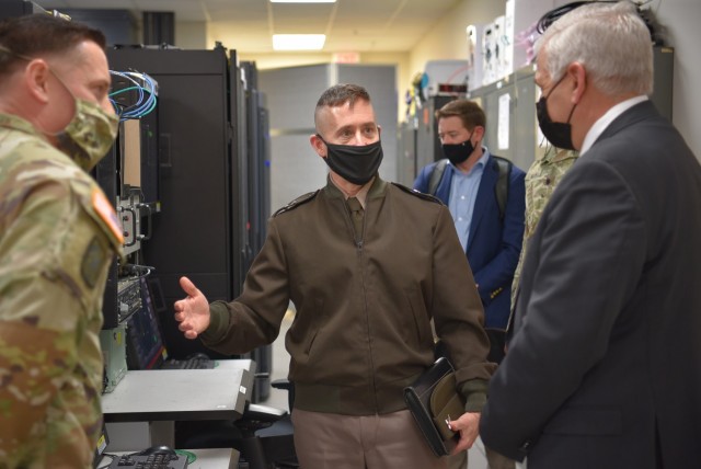 Program Executive Officer Missiles and Space Maj. Gen. Robert A. Rasch Jr. briefs Christopher J. Lowman, the senior official performing the duties of Under Secretary of the Army, on the Integrated Air and Missile Defense Battle Command System’s...