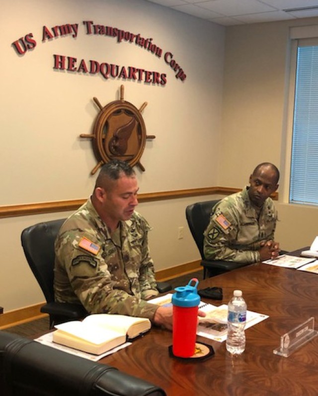 Command Sgt. Maj. Terrence T. Scarborough, Trans. Corps CSM, converses with CSM Jorge Escobedo, CASCOM CSM, during a recent meeting at the Trans. Corps headquarters in Mifflin Hall.