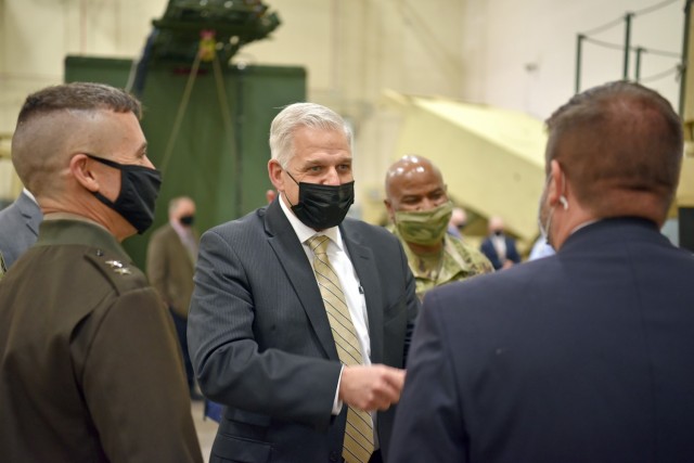 Christopher J. Lowman, the senior official performing the duties of Under Secretary of the Army, discusses the Patriot Advanced Capability-3 and Missile Segment Enhancement Missile Round Trainers with Kam Walker, PAC-3 MRT product director while...