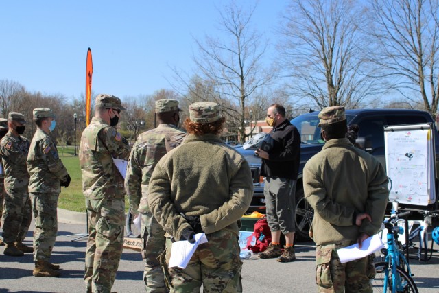 Members from the Kentucky Mountain Bike Association - Lincoln Trails talk to Soldiers from the 1st Theater Sustainment Command about bike safety during the unit's safety stand down held at Fort Knox, Kentucky, April 2, 2021. They encouraged bikers to use the buddy system and to enjoy the many trails in the area.