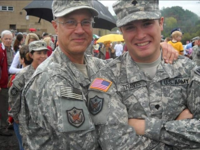 Father and son share the Army Unit Patch Multi-national Forces-Iraq after their deployments to Iraq. Staff Sgt. John ‘Jordan’ Travis, domestic operations management support, emergency operations center, NCOIC, deployed in 2009. His father,...