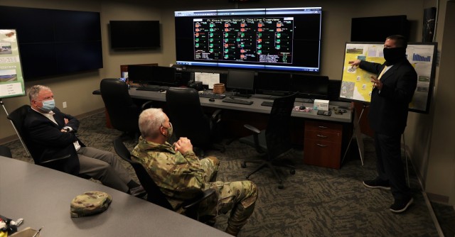The Fort Knox Energy Team and Commanding General of U.S. Army Cadet Command and Fort Knox Maj. Gen. John Evans brief U.S. Rep. Doug Lamborn on how the installation’s unique power generation capabilities allow it to be fully self-sustaining...